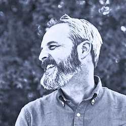 Black and white photo of Dave Gilson